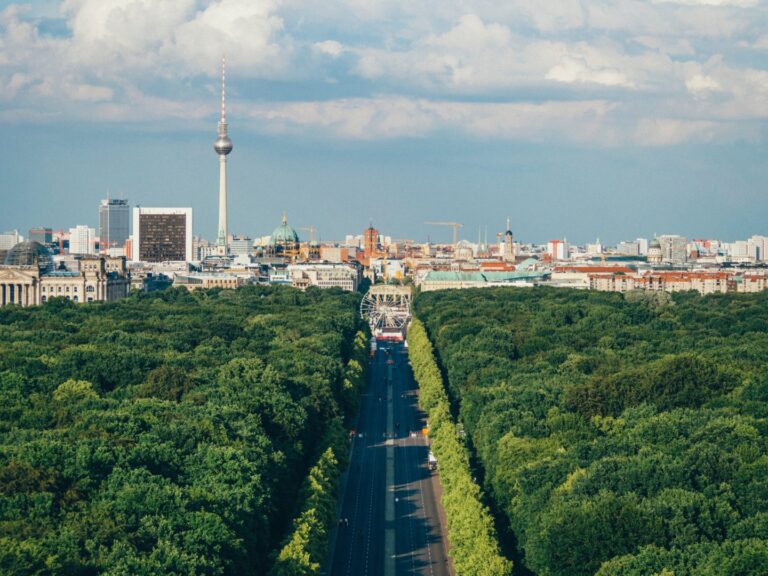 View of Berlin skyline with the TV tower and wide green boulevard
