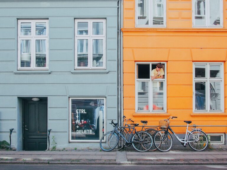 Colorful buildings and bikes in a cozy Copenhagen street scene