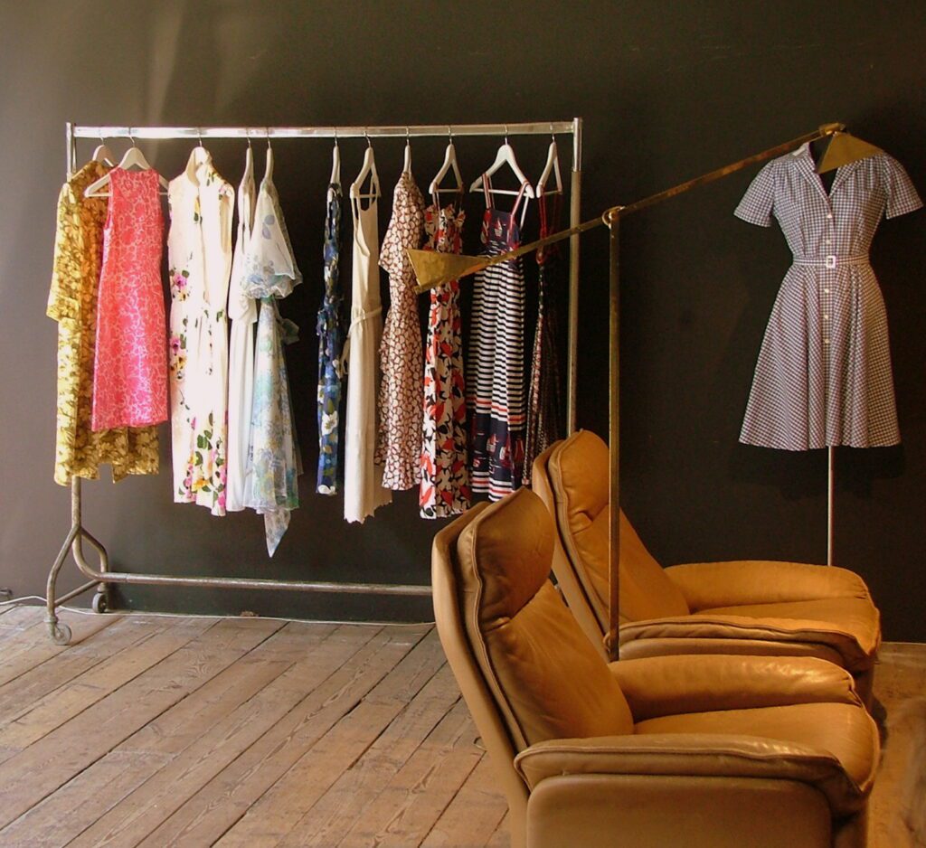 clothing rack and sofa in a vintage shop - second hand Cologne