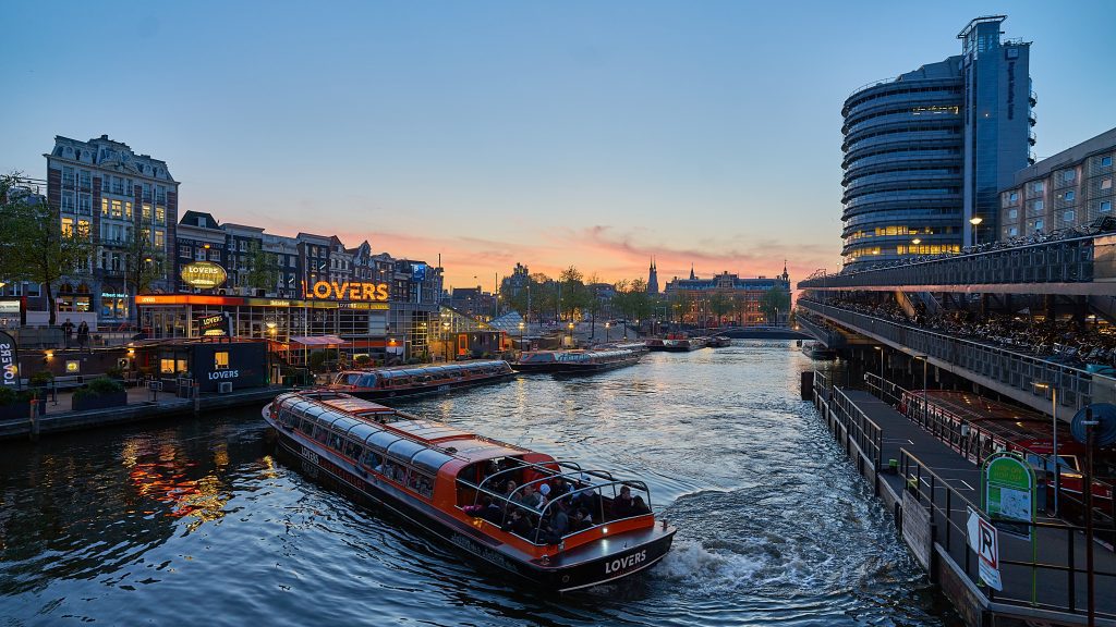 Stag party in Amsterdam: Charming Amsterdam canal with a Lovers canal cruise at sunset 