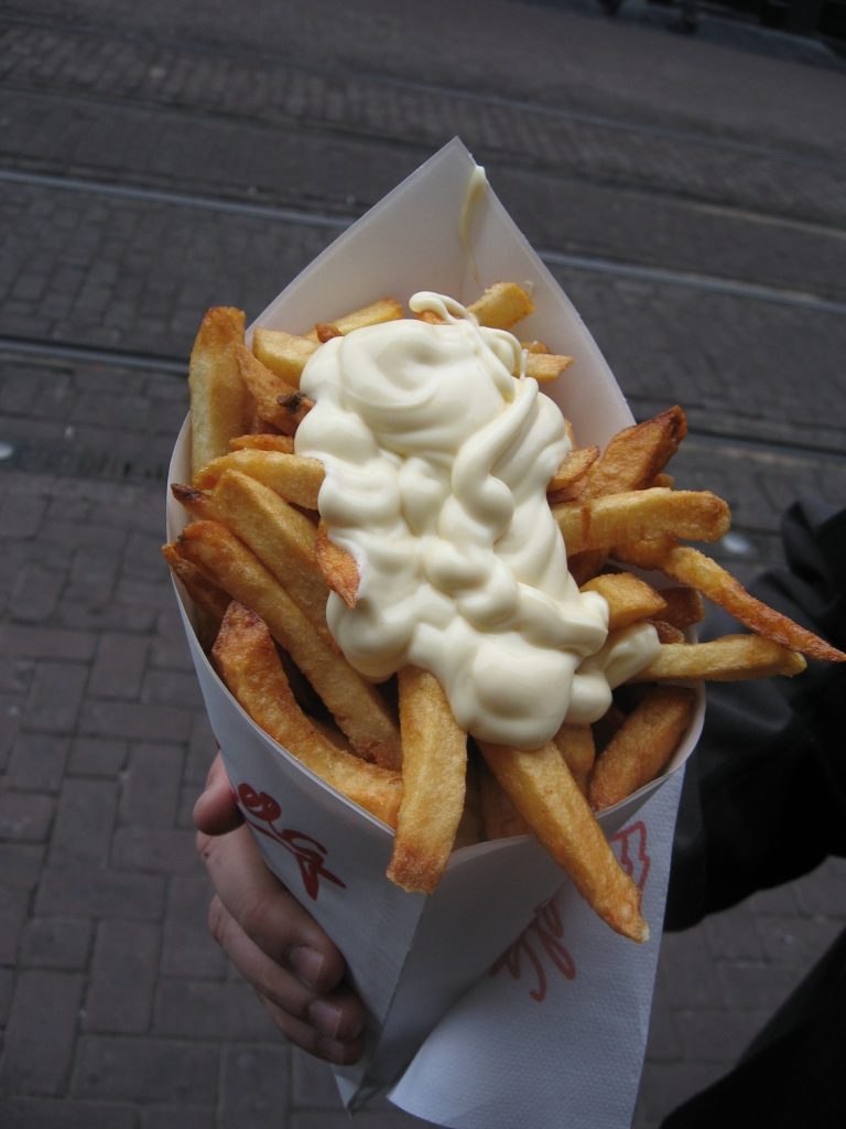 Stag party in Amsterdam: Dutch fries with mayonnaise in a street-food cone in Amsterdam 