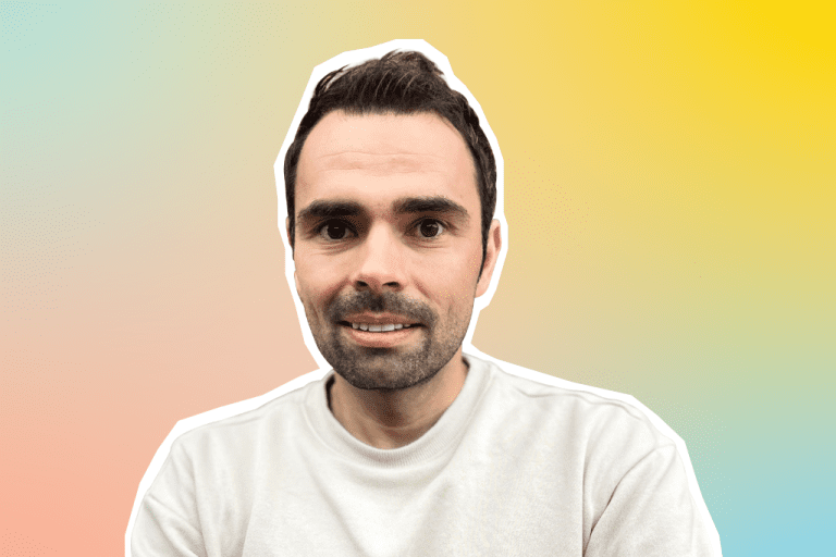 A portrait of Johannes on a colourful background