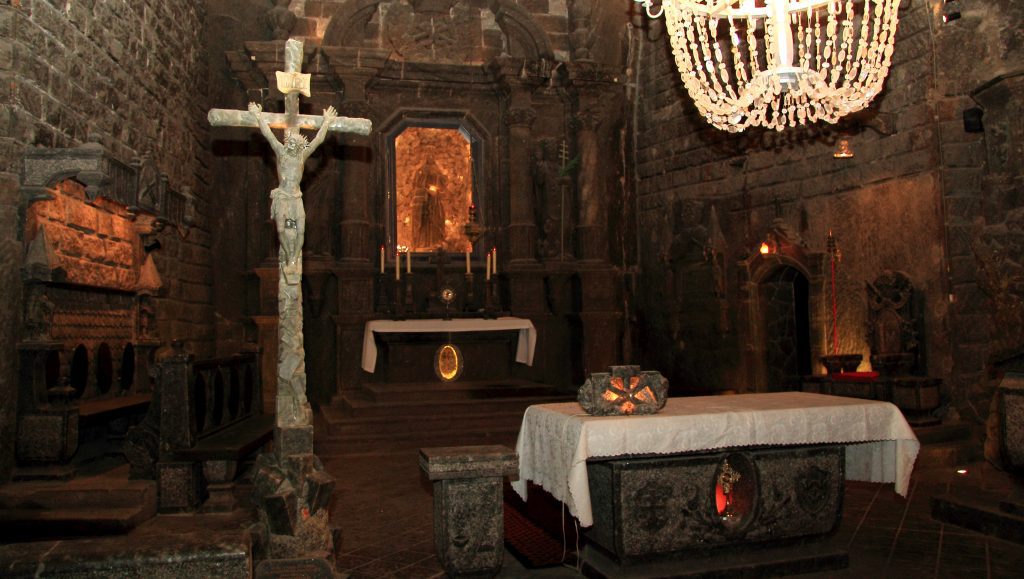 Trips to salt mines Krakow: Underground salt chapel with sculptures and chandeliers
