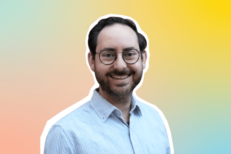Portrait of Eric, Head of Change, on a colorful background