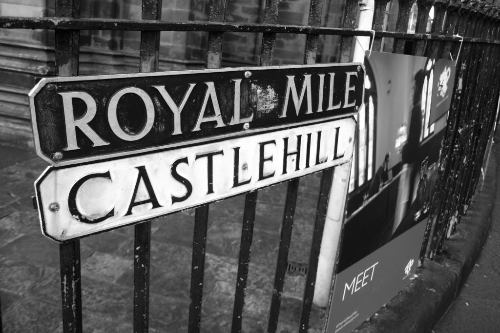 Edinburgh on a budget: Close-up of Royal Mile street sign in Edinburgh’s Old Town