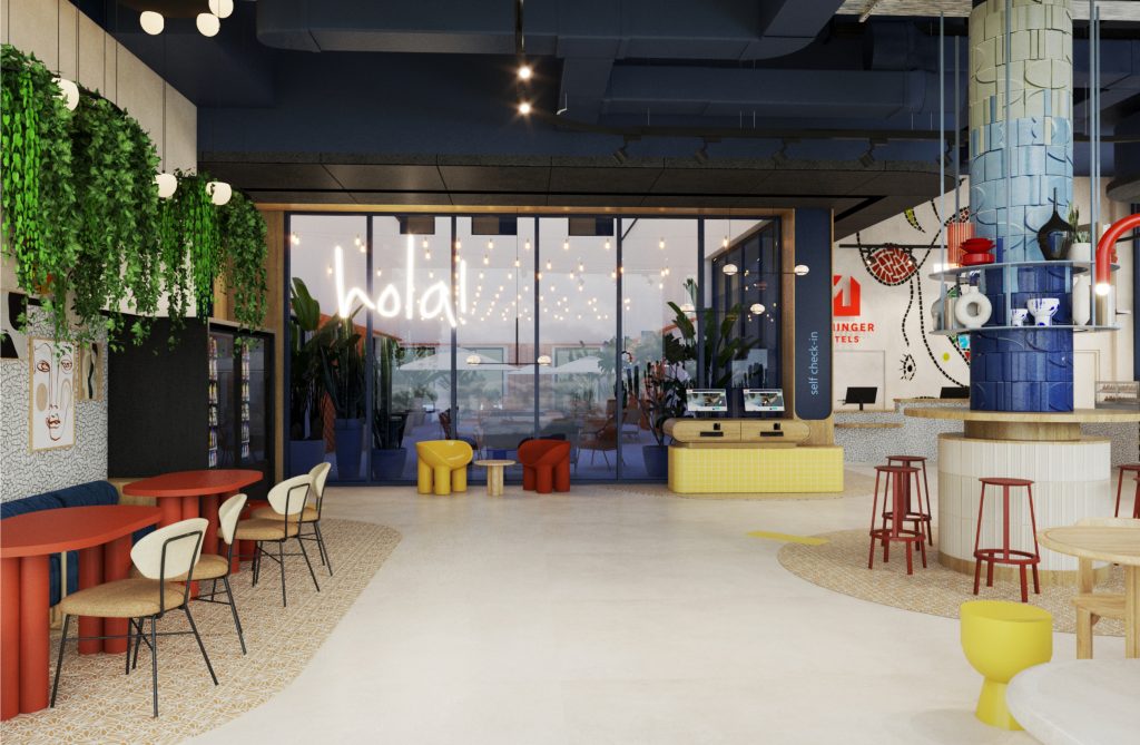 Colorful modern lounge area with blue wall, red and yellow furniture
