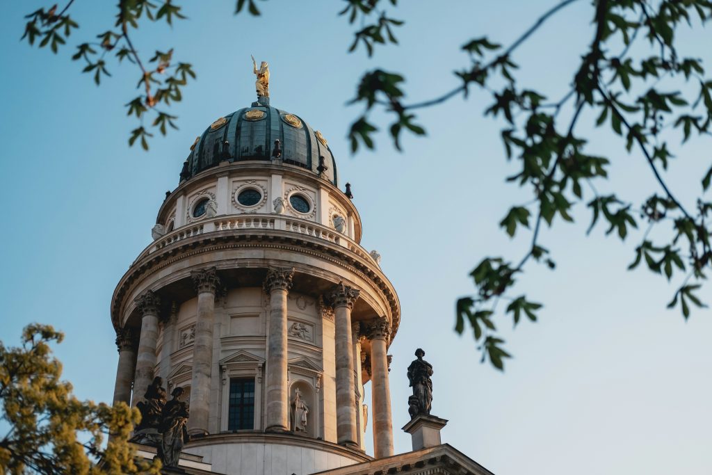 Free things to do in Berlin: Dome of the Deutscher Dom in Berlin at sunset
