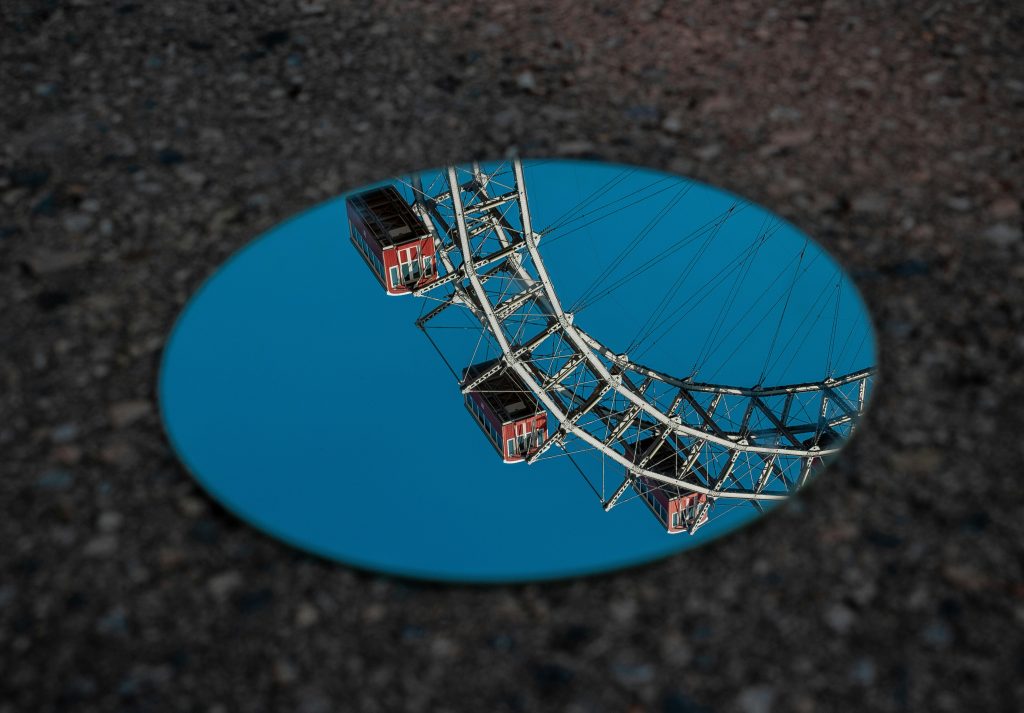 Instagram Wien: Kreative Spiegelreflexion des Wiener Riesenrads im Prater