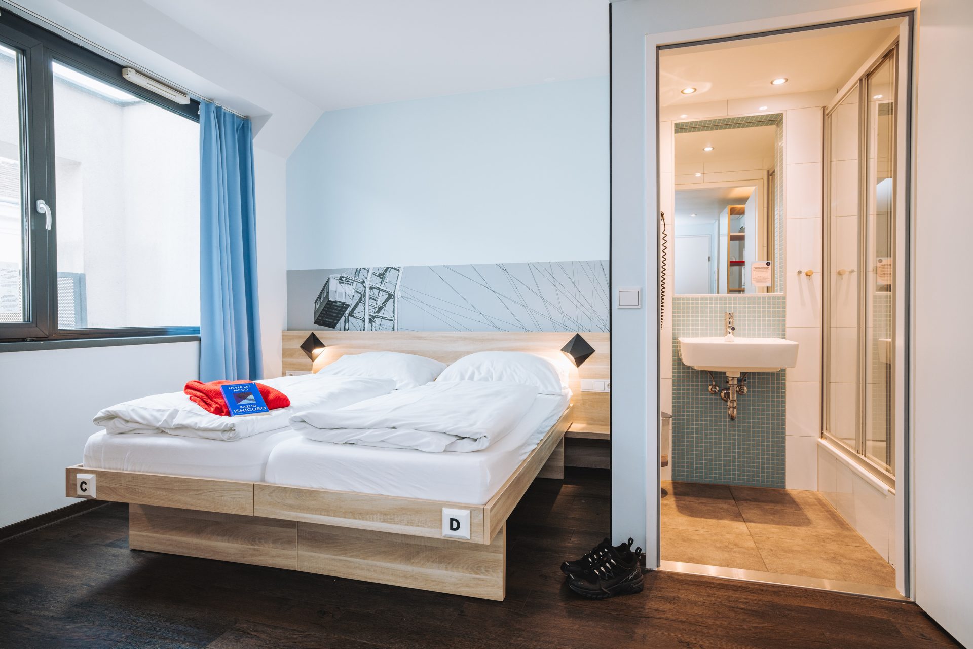Spacious double room at MEININGER Hotel Vienna Downtown Franz