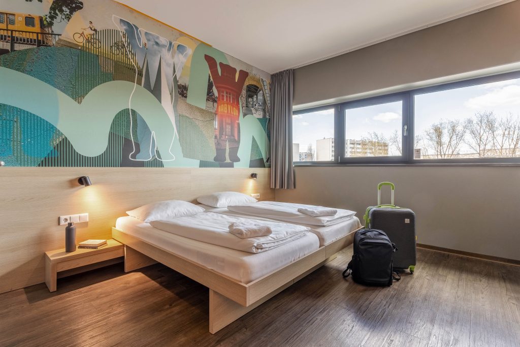Double room with Berlin wall decor