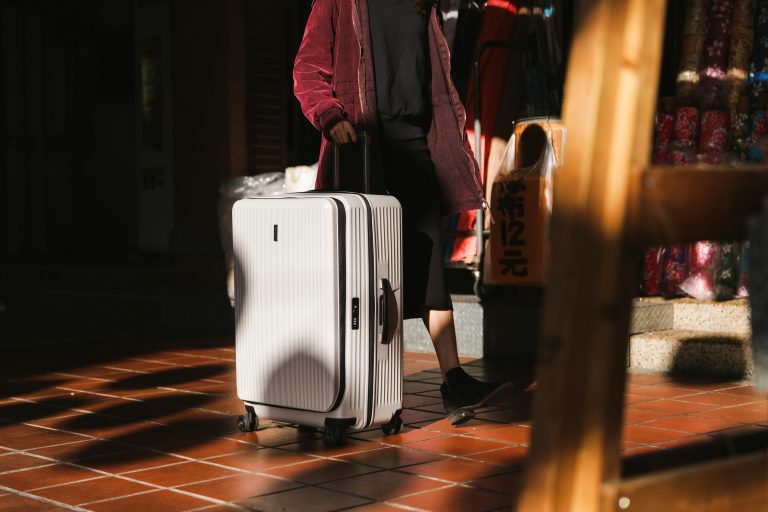 A woman carrying a luggage