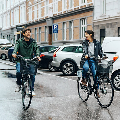 Traveler enjoying the atmosphere near MEININGER Hotels, perfect for city explorers
