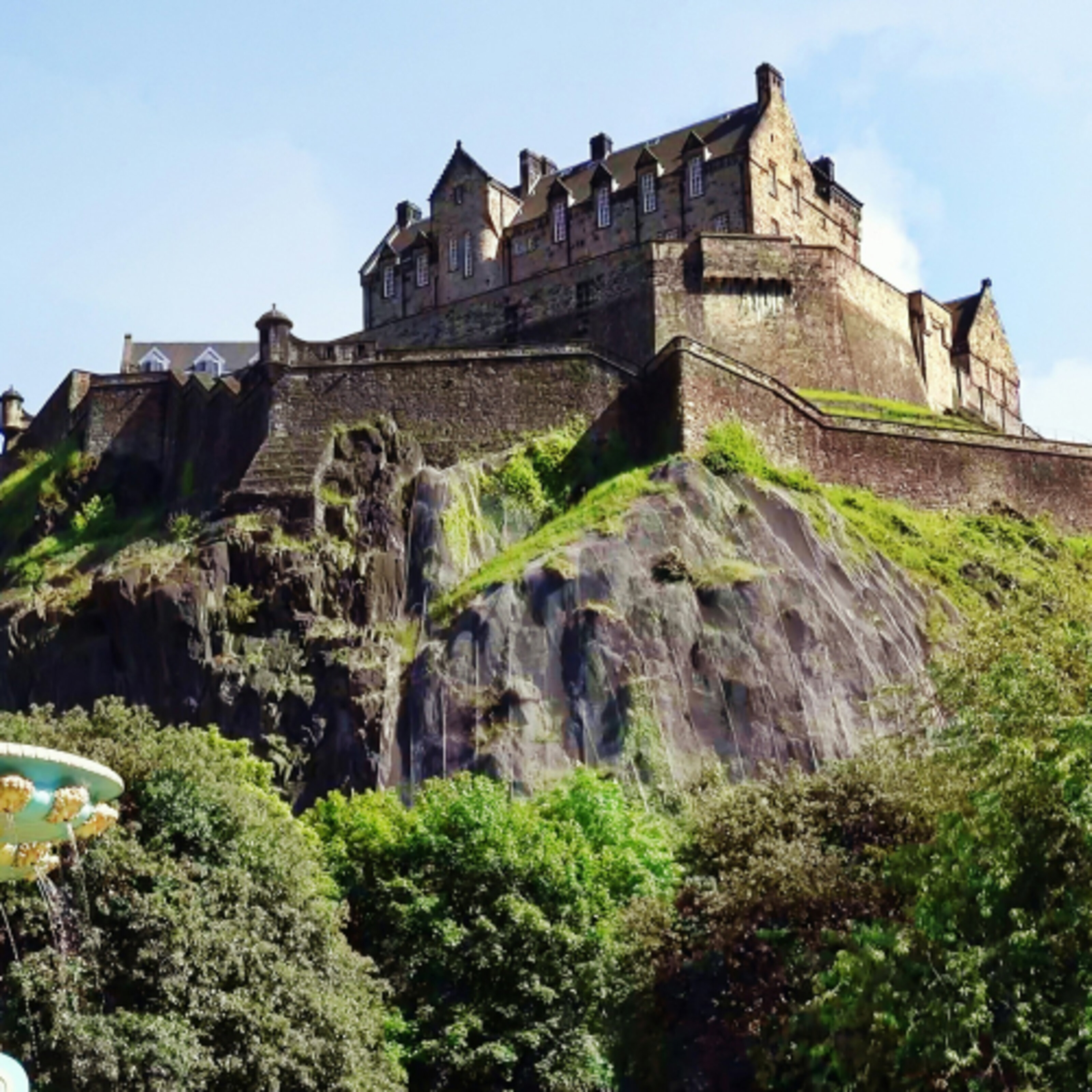 Big old castle on a rocky hill in Edinburgh