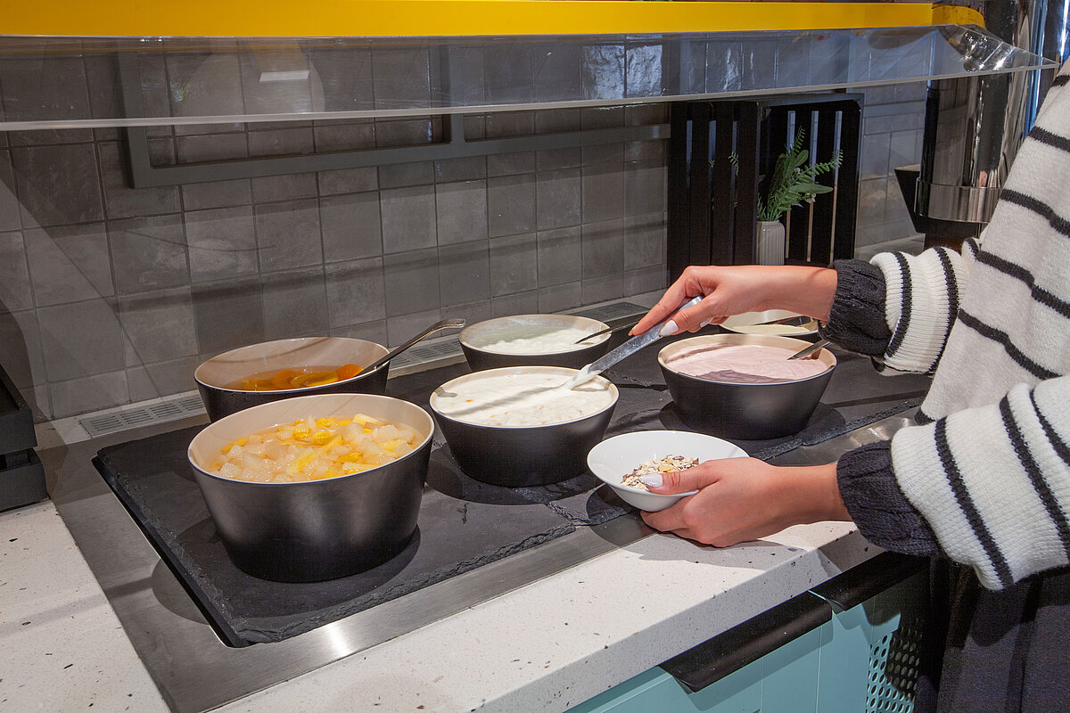 Salle de petit déjeuner MEININGER Hotel München Zentrum